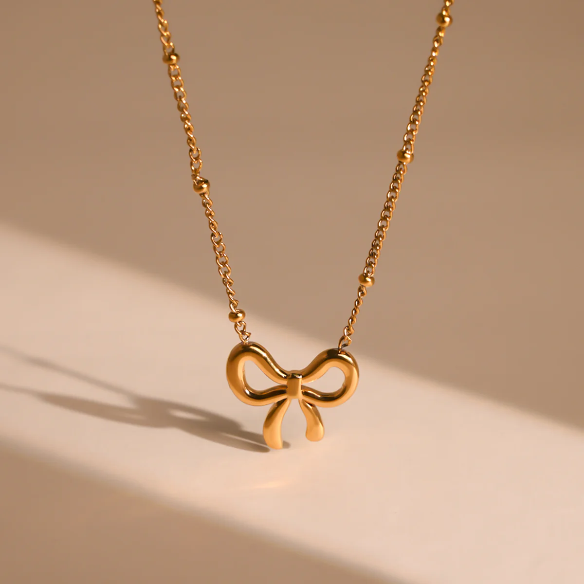Golden Bow Serenade Neckpiece - Image 3